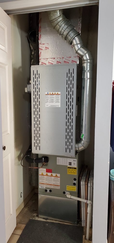 Gas furnace and venting in a home utility closet